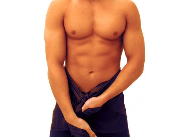 A man performs exercises to enlarge his penis